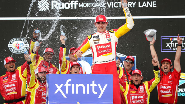 Sammy Smith celebrates in victory lane this past March after winning the NASCAR Xfinity Series United Rentals 200 at Phoenix Raceway. (Photo by Meg Oliphant/Getty Images)